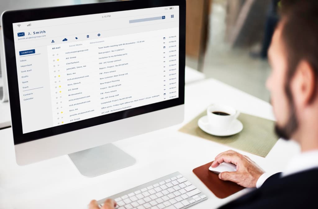 Man sitting in front of a computer