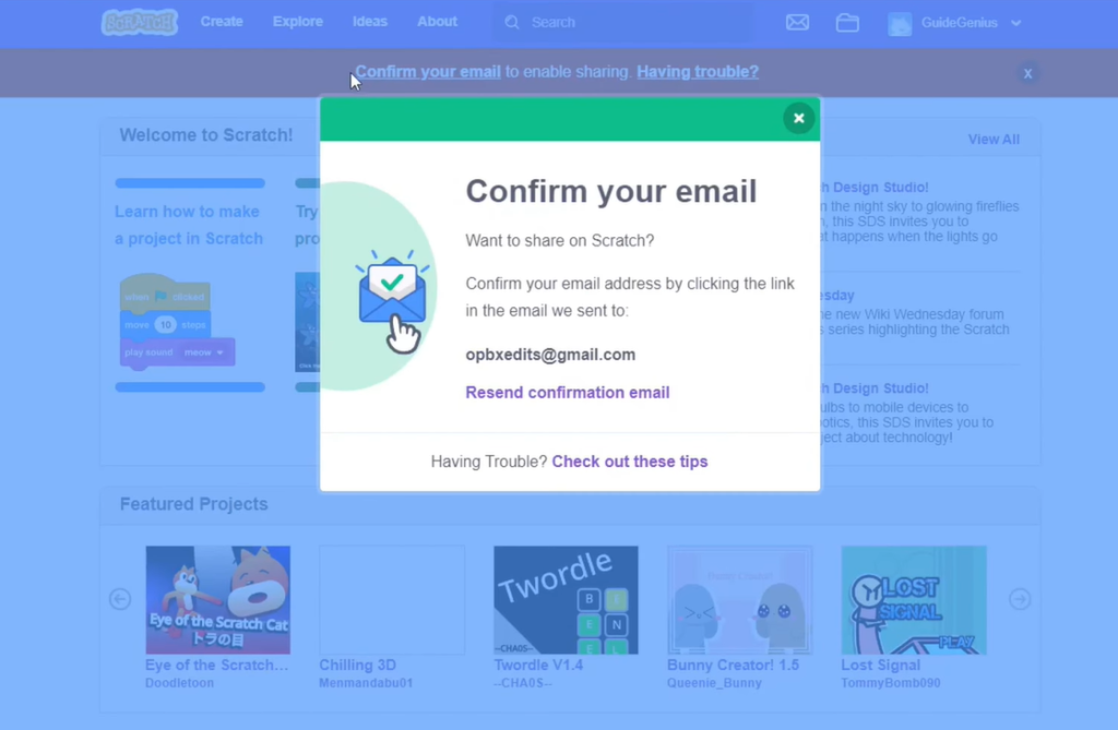 A pop-up window on Scratch prompts email verification for sharing